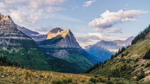 Panoramic view of landscape against cloudy sky