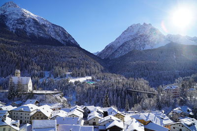 Scenic view of snowcapped mountains against sky during winter