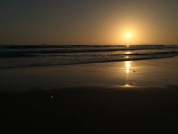 Scenic view of sea at sunset