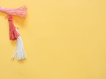 Close-up of clothes hanging on wall