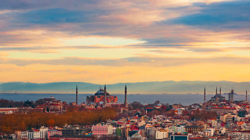 High angle view of townscape against sky during sunset