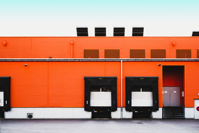 Exterior of red building against clear sky