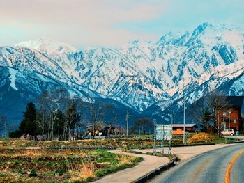 Scenic view of snowcapped mountains against sky