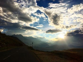 Scenic view of road against sky during sunset