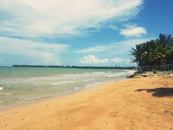 Scenic view of beach against sky