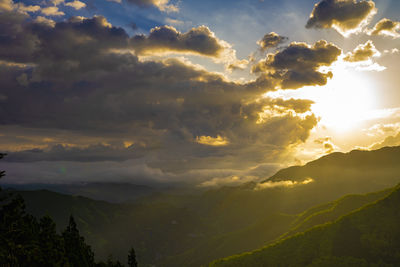 Low angle view of dramatic sky during sunset