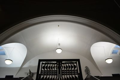 Low angle view of illuminated ceiling