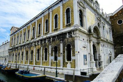 View of canal along buildings