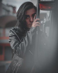 Portrait of beautiful young woman with high heels