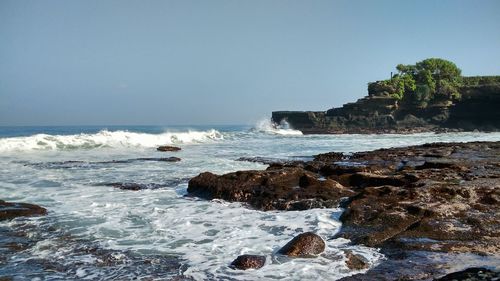 Scenic view of sea against clear sky