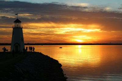 Scenic view of calm sea at sunset