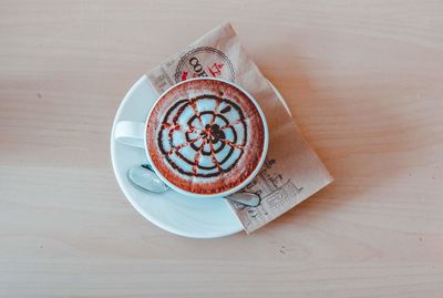 High angle view of coffee cup on table