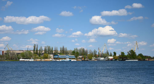 View of the river port with landing stage and cranes on a summer day. kherson ukraine