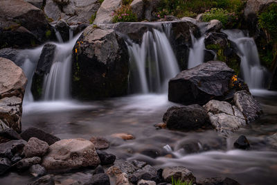 View of waterfall in forest