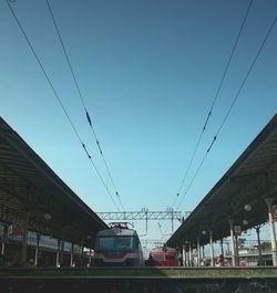 Low angle view of electricity pylon