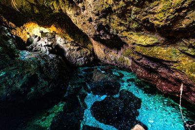 High angle view of rock formation in sea