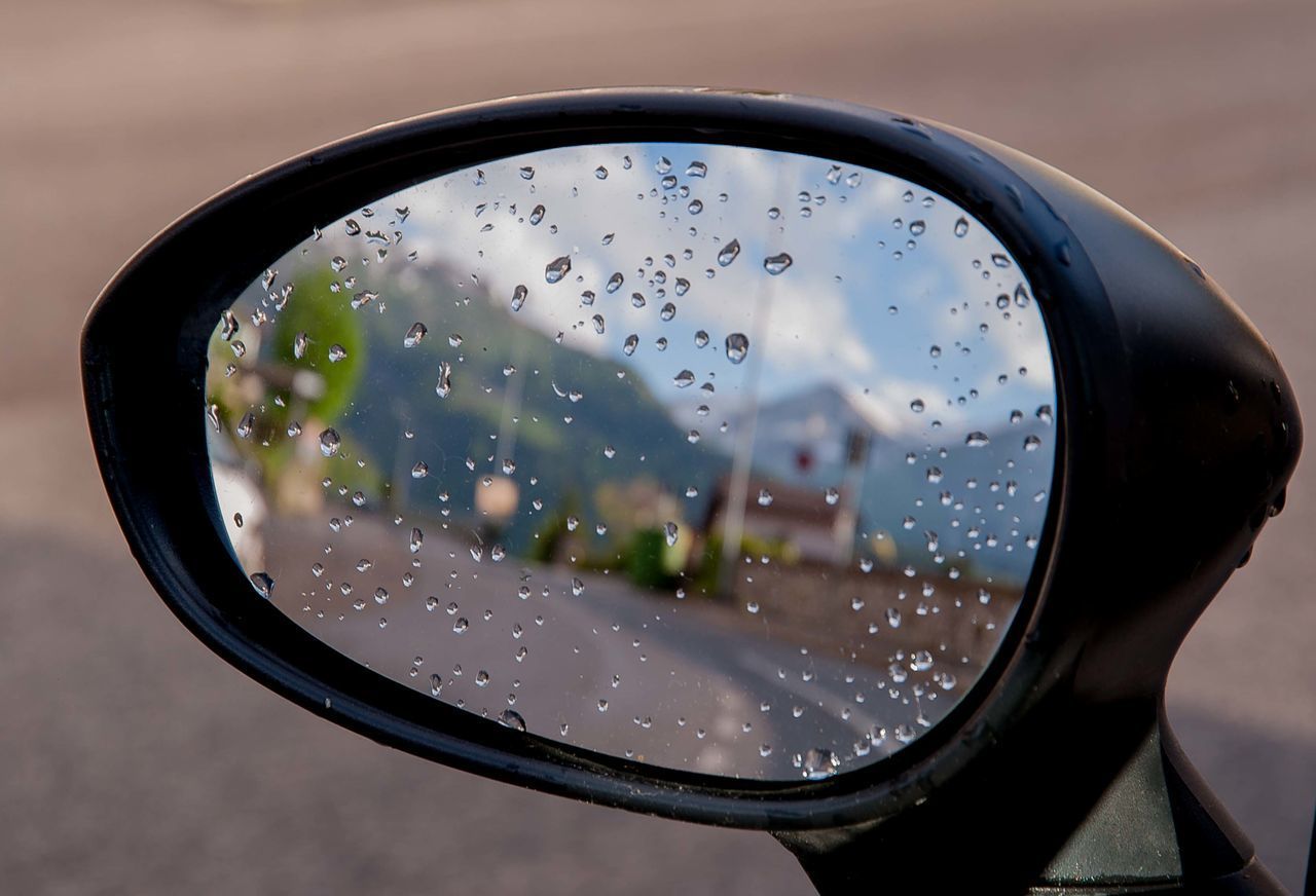 CLOSE-UP OF WET GLASS WINDOW