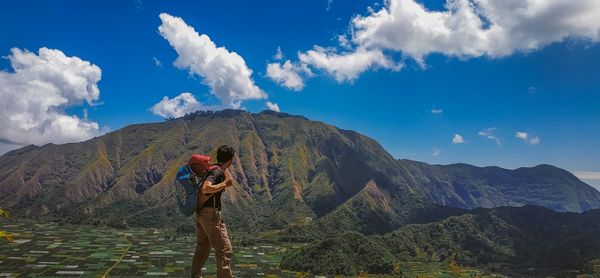 A man was walking on a very beautiful mountain