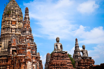 Low angle view of old temple building against sky