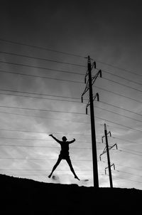 Silhouette of horse against sky