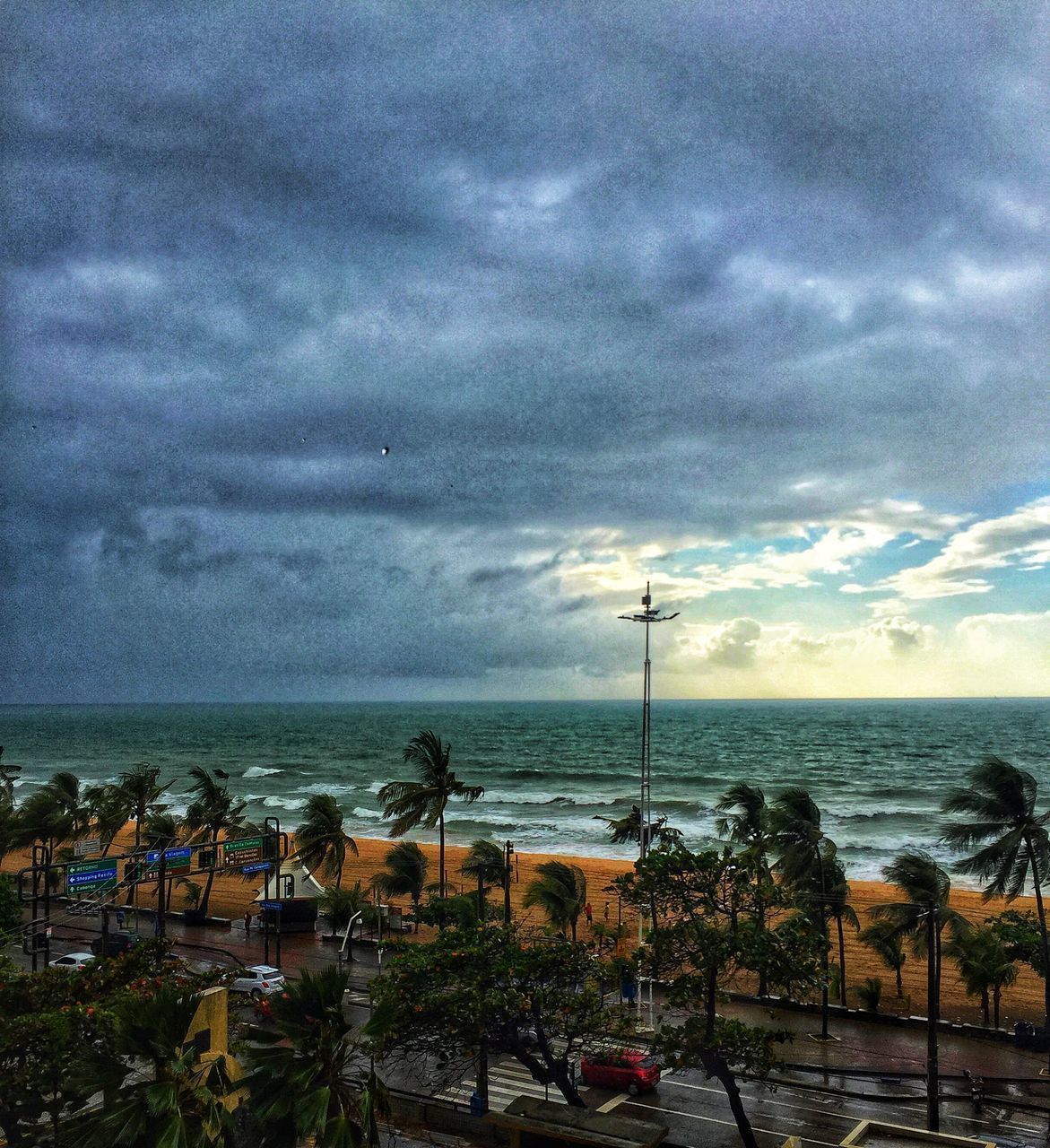 SCENIC VIEW OF BEACH AGAINST SKY DURING SUNRISE