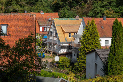 High angle view of old building by trees