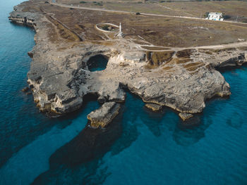 High angle view of rocks in sea