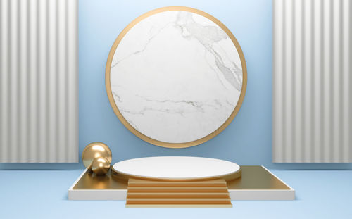 Close-up of objects on table against wall