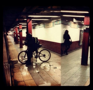 Full length of woman standing in subway