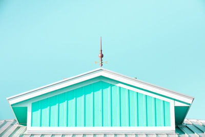 Low angle view of building against clear blue sky