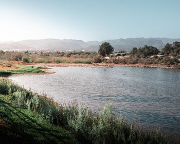 Scenic view of lake against clear sky