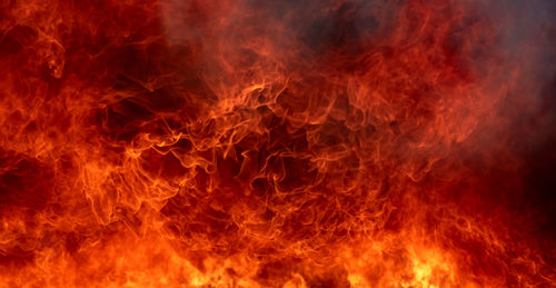 Close-up of fire against black background