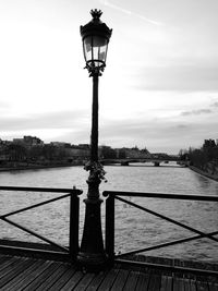 Street light against sky