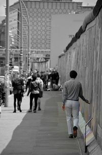 Full length of woman walking in city