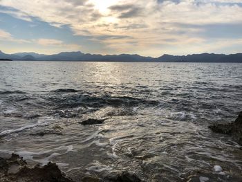 Scenic view of sea against sky during sunset