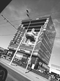 Low angle view of buildings in city against sky