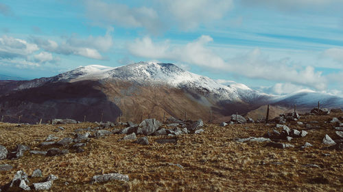 Scenic view of snowcapped mountains against sky