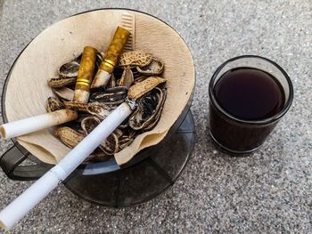 High angle view of cigarette on table