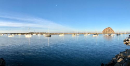 Scenic view of sea against blue sky