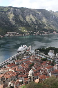 High angle view of townscape by lake