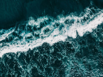 Close-up of waves splashing in sea