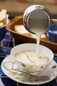 Close-up of coffee cup on table