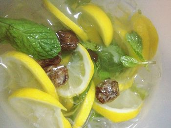 Close-up of lemons on wooden table