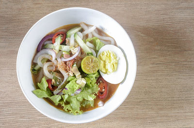 High angle view of salad in bowl on table