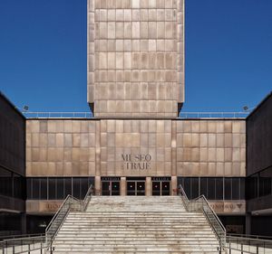 Low angle view of building against clear blue sky