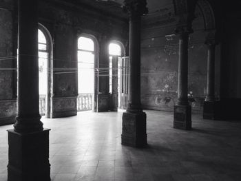 Illuminated corridor of historic building