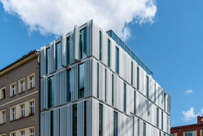 Modern office building with curtain wall and metal lattices in berlin mitte.