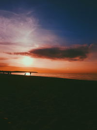 Scenic view of dramatic sky over sea