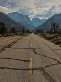 Surface level of road against mountain range