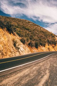Road leading towards mountains